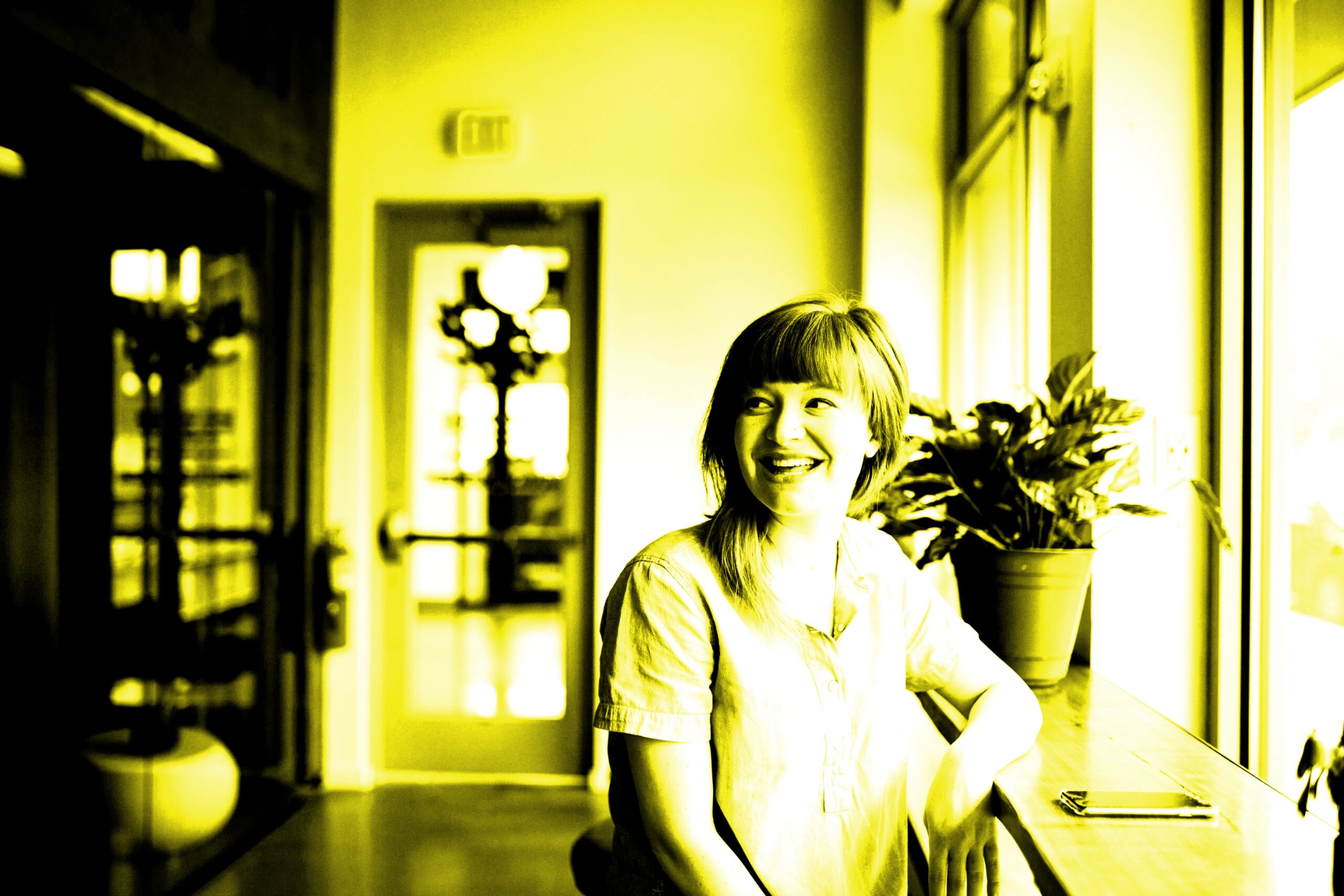 picture of a woman with a yellow filter